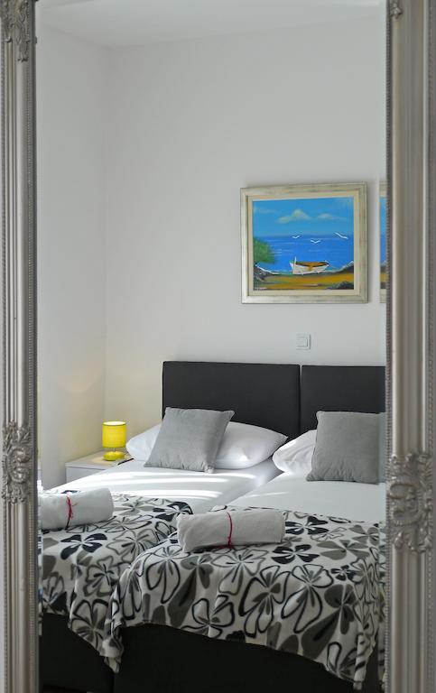 Tweepersoonskamer met 2 Aparte Bedden